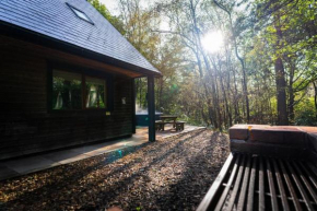 Denstone, woodland lodge with hot tub for 8